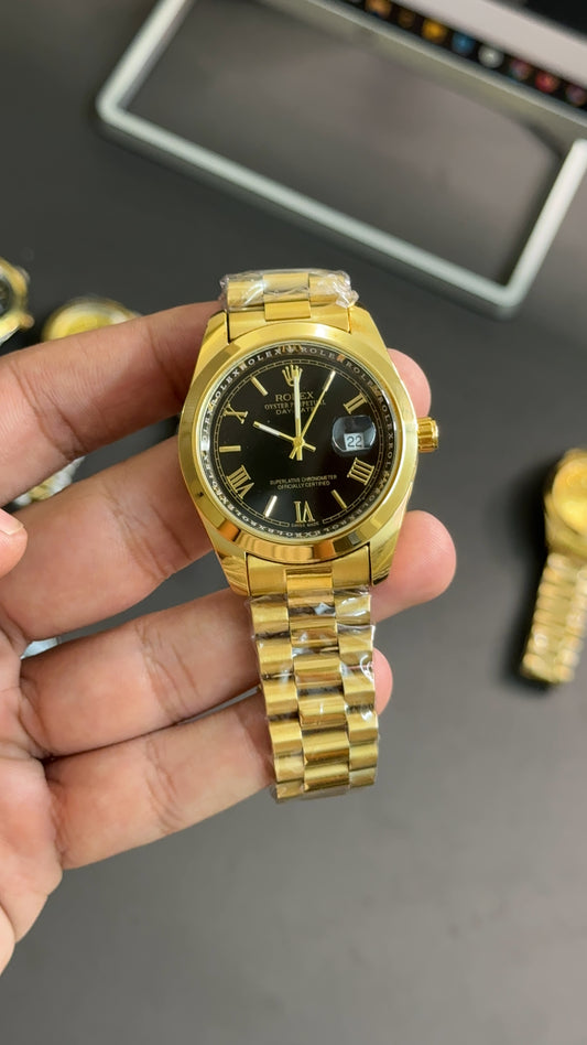 Date41 gold black dial