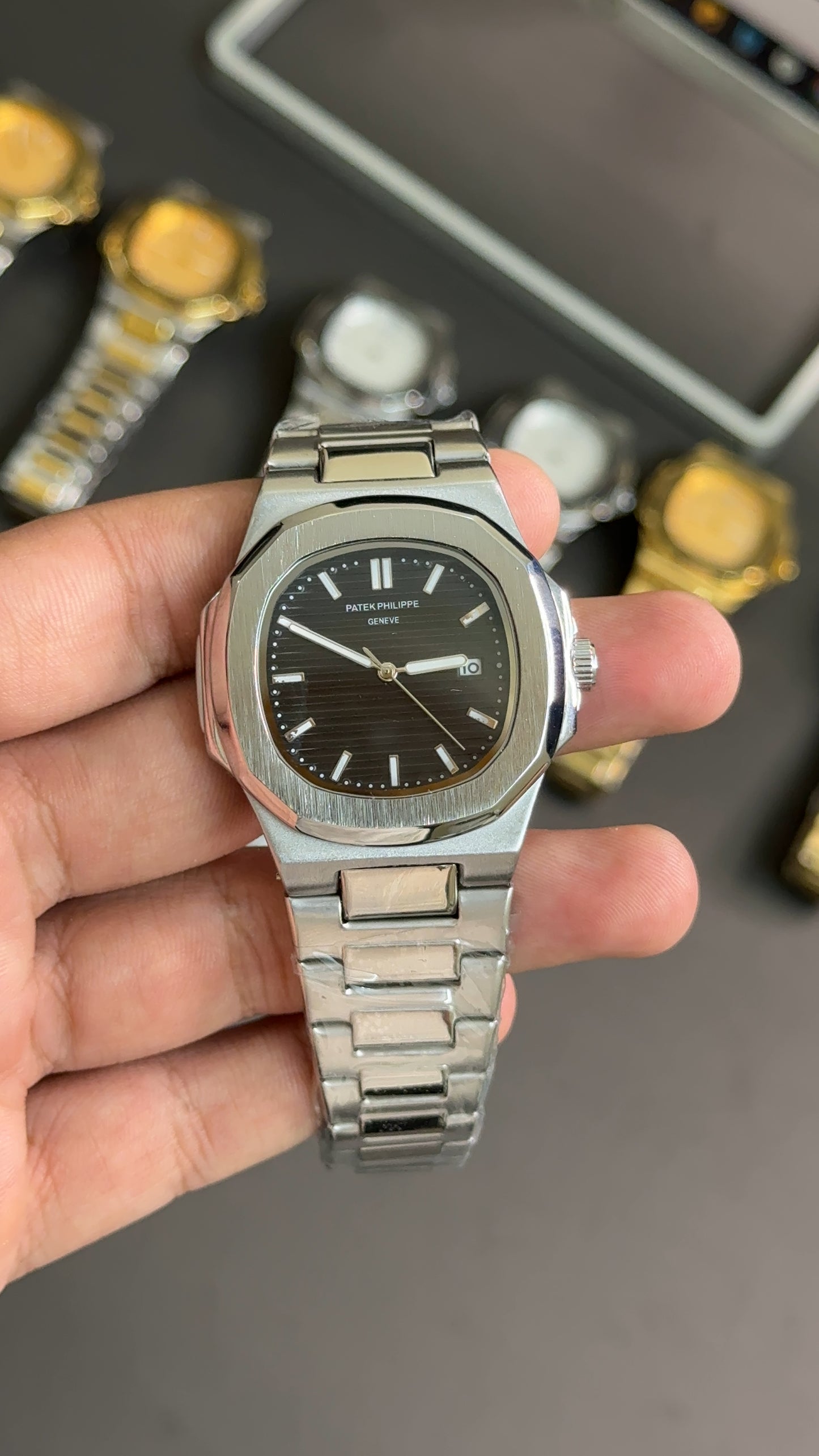 Pp silver black dial