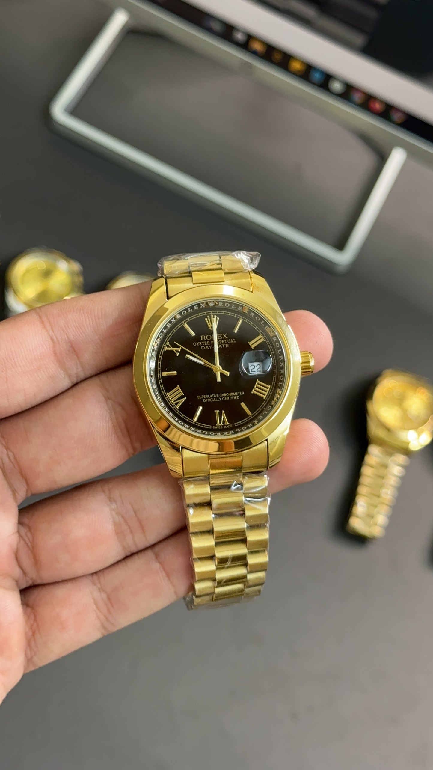 Date41 gold black dial